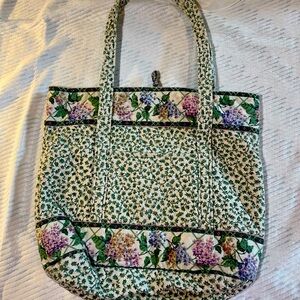 Vintage Lilacs Vera Bradley- Great bag lots of pockets. Great for traveling!